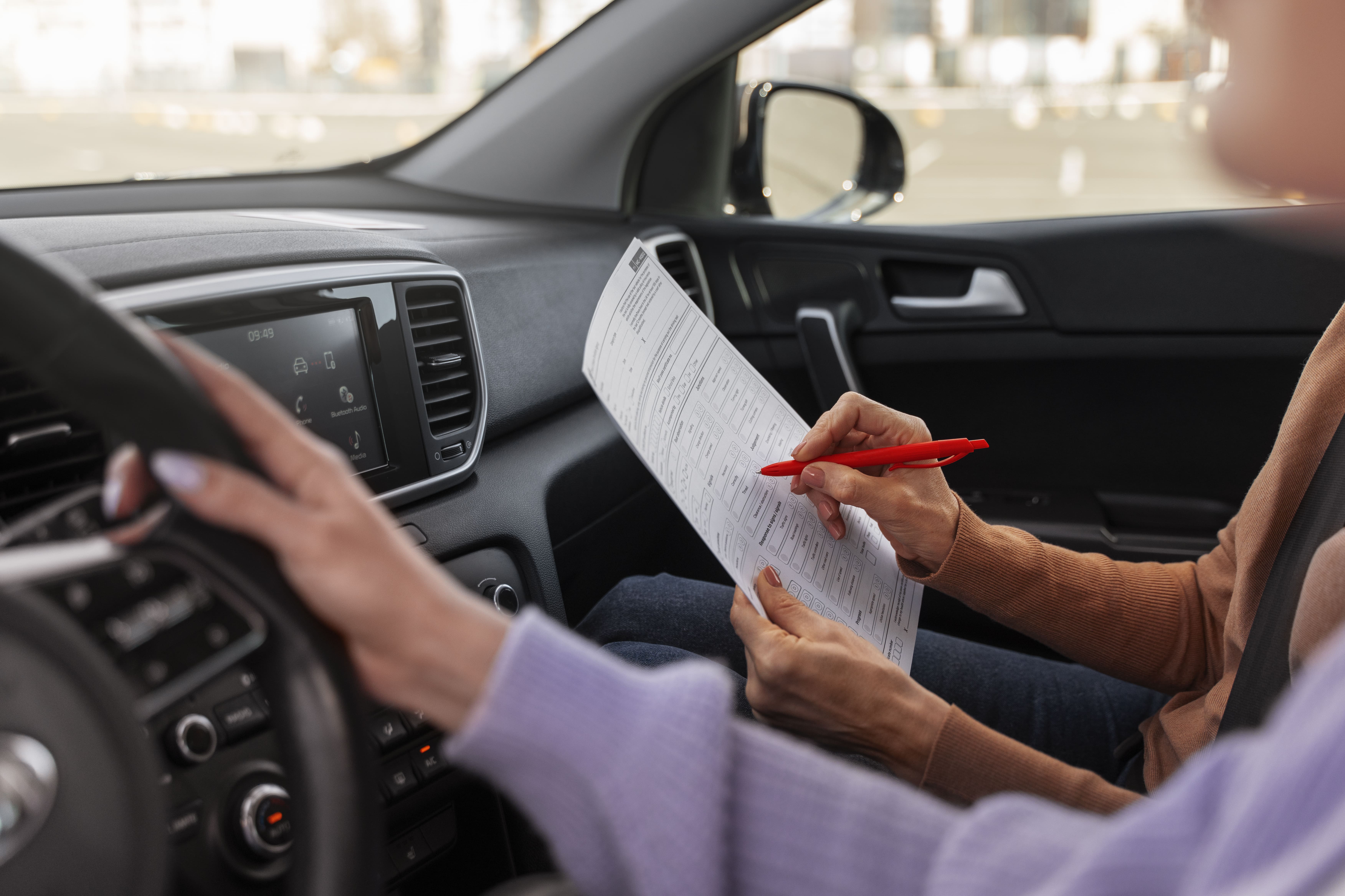 woman-taking-her-driver-s-license-test-vehicle (1)