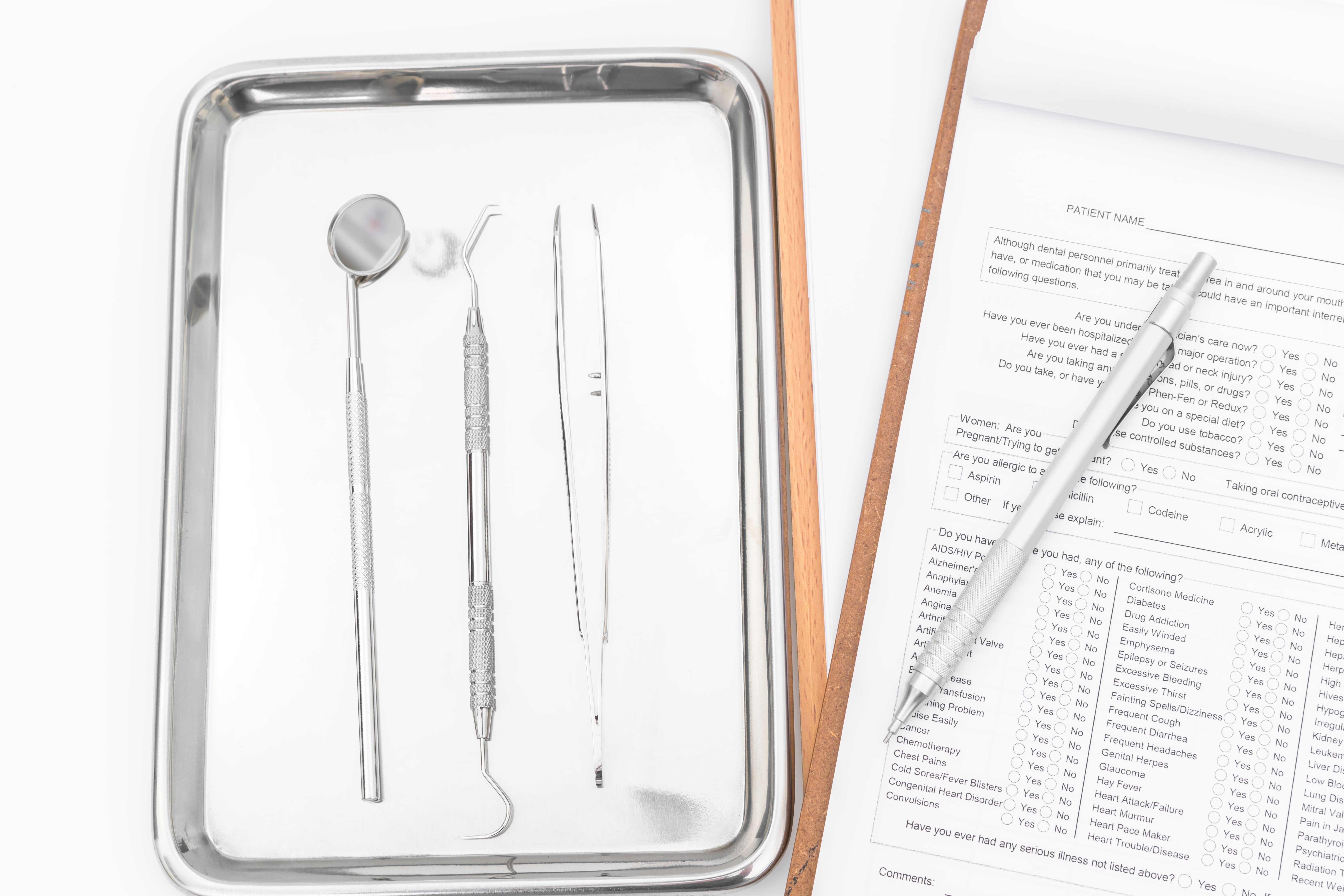 dental-tools-equipment-dental-chart-white-background