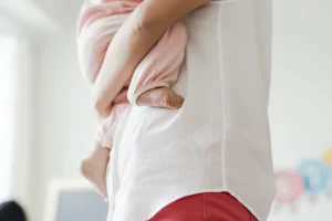 cropped-photo-parent-carrying-baby